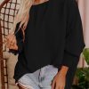 Black Smocked Wrist Shift Top