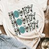 White Howdy Turquoise Cow Spots Graphic Tee