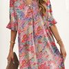 Boho Mini Dress With Floral Patterns And Ruffled Details