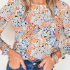 Colorful Floral Top With Sheer Sleeves And Smocked Cuffs