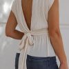 Elegant Apricot Ribbed Tank Top With Deep V-Neck And Open Back Design