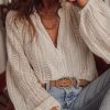 Elegant White V-Neck Lace Blouse With Long Sleeves And Button Up Front