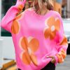 Stay Cozy And Stylish With This Women's Pink Floral Print Sweater