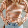 Upgrade Your Wardrobe With This Casual And Comfortable Orange Striped Long Sleeve Tee