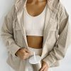 Stay Warm And Trendy With This Khaki Corduroy Hooded Shacket For Women