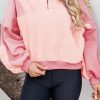 Stay Warm And Fashionable With This Pink Zip Neck Sweatshirt For Women