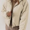 Stay Warm And Stylish With This Fashionable Apricot Puffer Coat