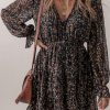 Flirty And Feminine: Flowy V Neck Ruffled Puff Sleeve Dress In Black