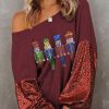 Glamorous And Casual: Burgundy Sequined Nutcracker Doll Knit Top For A Lovely Look