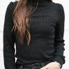 Elegant And Playful: Black Solid Color Ruffled Long Sleeve Top For Women