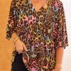 Elegant Summer Peplum Hem Blouse - All-Over Leopard Print Design