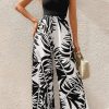 Black Halter Tropical Plant Print Wide Leg Jumpsuit