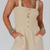 Versatile And Stylish Beige Romper With Smocked Bodice And Buttoned Design