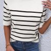 Soft And Stylish: Women's White Striped Knitted Tee With Half Sleeves