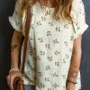 Elegant And Trendy Beige Floral Textured Top With Fringe Accents