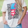 Lightning Flash: White Leopard Print Graphic T-Shirt With A Twist Of Stars And Stripes