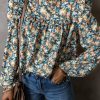 Flattering Sheath Silhouette: Sky Blue Floral Print Puff Sleeve Blouse