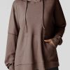 Versatile Women's Casual Hoodie: High Low Oversized Fit - Solid Color