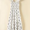 Women's Elegant Black Bow Print Smocked Square Neck Ruffle Tiered Maxi Dress - Image 7