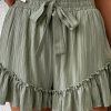 Women's Laurel Green Textured Tie Waist Ruffle Hem Shorts for Casual and Dressy Occasions - Image 6