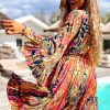 Women's Pink Floral Print Flared Sleeve Ruffled Hem Tunic Dress - Elegant V Neck High Waist Bohemian Style - Image 2