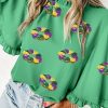 Chic Women's Green Sequin Doughnut Graphic Blouse with Ruffled Trim and Bell Sleeves for Mardi Gras - Image 6