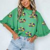 Chic Women's Green Sequin Doughnut Graphic Blouse with Ruffled Trim and Bell Sleeves for Mardi Gras - Image 3