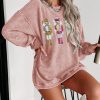 Women's Pink Oversized Sweatshirt with Festive Nutcracker Pattern - Image 3