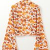 Chic Women's Orange Floral Printed Bell Sleeve Blouse with Mock Neck and Scallop Trim - Image 9