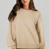 Women's Parchment Solid O Neck High Low Hem Pullover Sweatshirt - Image 3