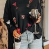 Women's Black Dolman Sleeve High Neck Split Top with Drinks Patched Graphic - Image 2