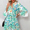 Women's Green Tribal Printed Mini Dress with Buttoned Flounce Sleeves - Image 3