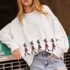 Women's Festive White Nutcracker Doll Graphic Sweatshirt with Colorful Stitch Trim - Image 8