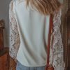 Women's Elegant White Lace Blouse with Scalloped V Neckline and Hollowed Lantern Sleeves - Image 3