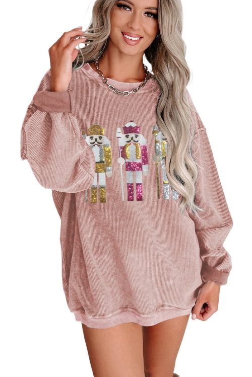 Women's Pink Oversized Sweatshirt with Festive Nutcracker Pattern