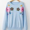 Women's Light Blue Knitted Sweater with Floral Pattern and Ribbed Edge - Image 5