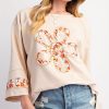 Beige Plus Size Flower Patched Crewneck Top with Side Slits for Stylish Comfort - Image 3