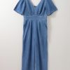 Women's Ashleigh Blue V Neck Short Sleeve Denim Loose Jumpsuit with Smocked Back - Image 6