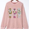 Women's Pink Oversized Sweatshirt with Festive Nutcracker Pattern - Image 6