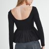 Women's Elegant Black Ribbed Knit Long Sleeve Scoop Neck Peplum Top - Image 2