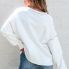 Women's Festive White Nutcracker Doll Graphic Sweatshirt with Colorful Stitch Trim - Image 2