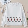 Women's Festive White Nutcracker Doll Graphic Sweatshirt with Colorful Stitch Trim - Image 10