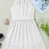 Elegant White Lace Sleeveless Mini Dress with Knot Back Detail and Tied Waist - Image 6