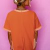 Women's Russet Orange Two-Tone Short Sleeve V Neck Loose Romper with Patched Pockets - Image 2