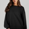 Women's Black Solid Pullover Sweatshirt with O Neck and High Low Hem - Image 3