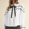 Women's Elegant White Shirt with Black Pipping, Ribbon Bowtie, and Ruffled Puff Sleeves - Image 5