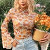 Chic Women's Orange Floral Printed Bell Sleeve Blouse with Mock Neck and Scallop Trim - Image 6