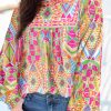 Women's Orange Geometric Print Long Sleeve Blouse with Keyhole Back - Image 2