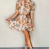 Chic Brown Abstract Printed Puff Sleeve Mini Dress with Button Up Front and Braided Belt - Image 4