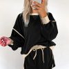 Women's Black Color Contrast Loose Pullover and Lace-Up Waist Skort Set - Image 6